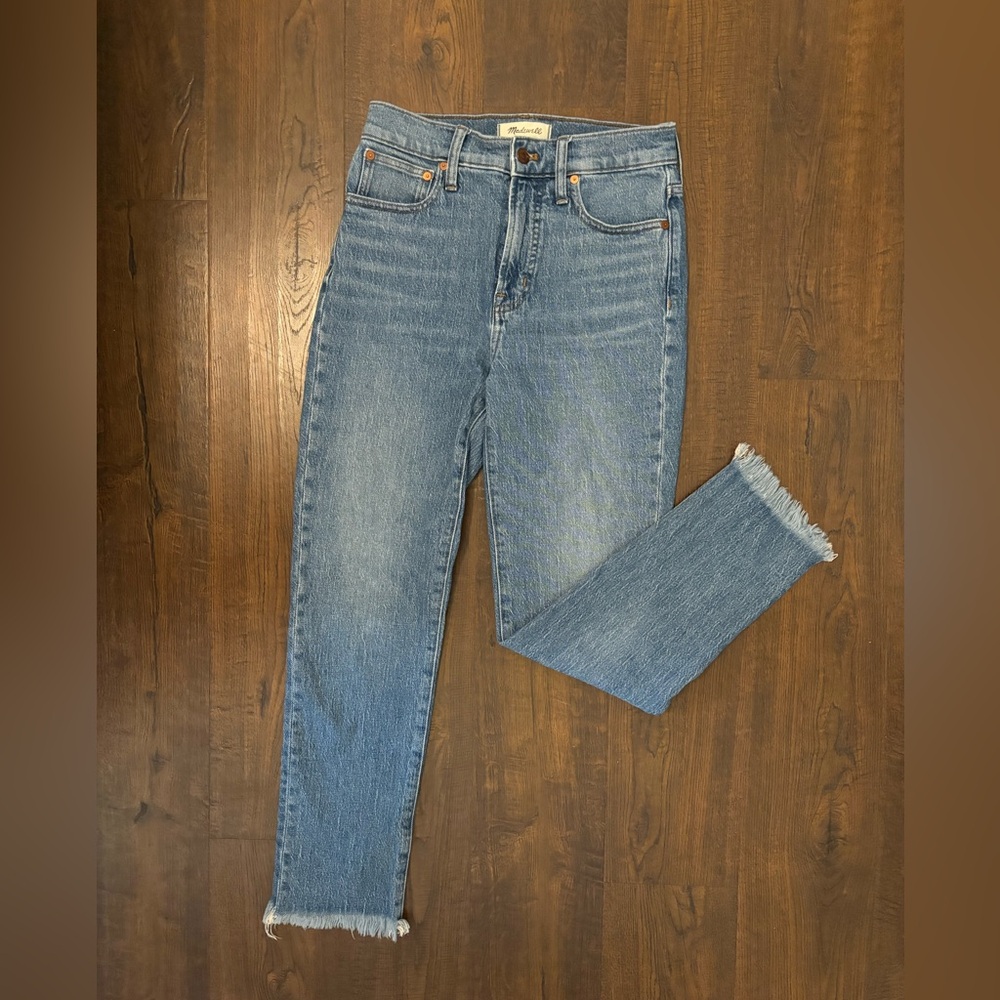 - Madewell- The Perfect Vintage Jean. Size 25. Light wash. Distressed bottoms.